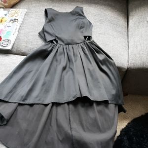 Black high-low cocktail dress with side cutouts